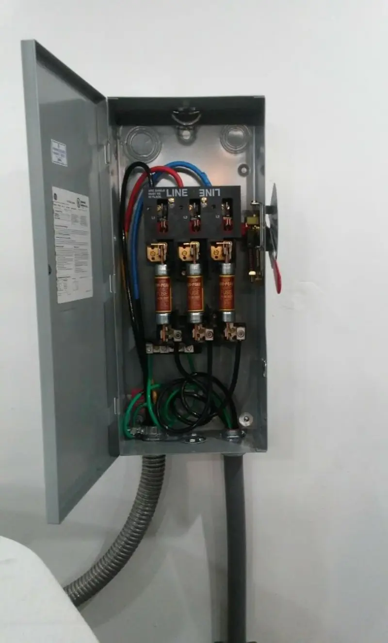 Three-phase disconnect switch installed for Smoke Detector Installation in Greensboro